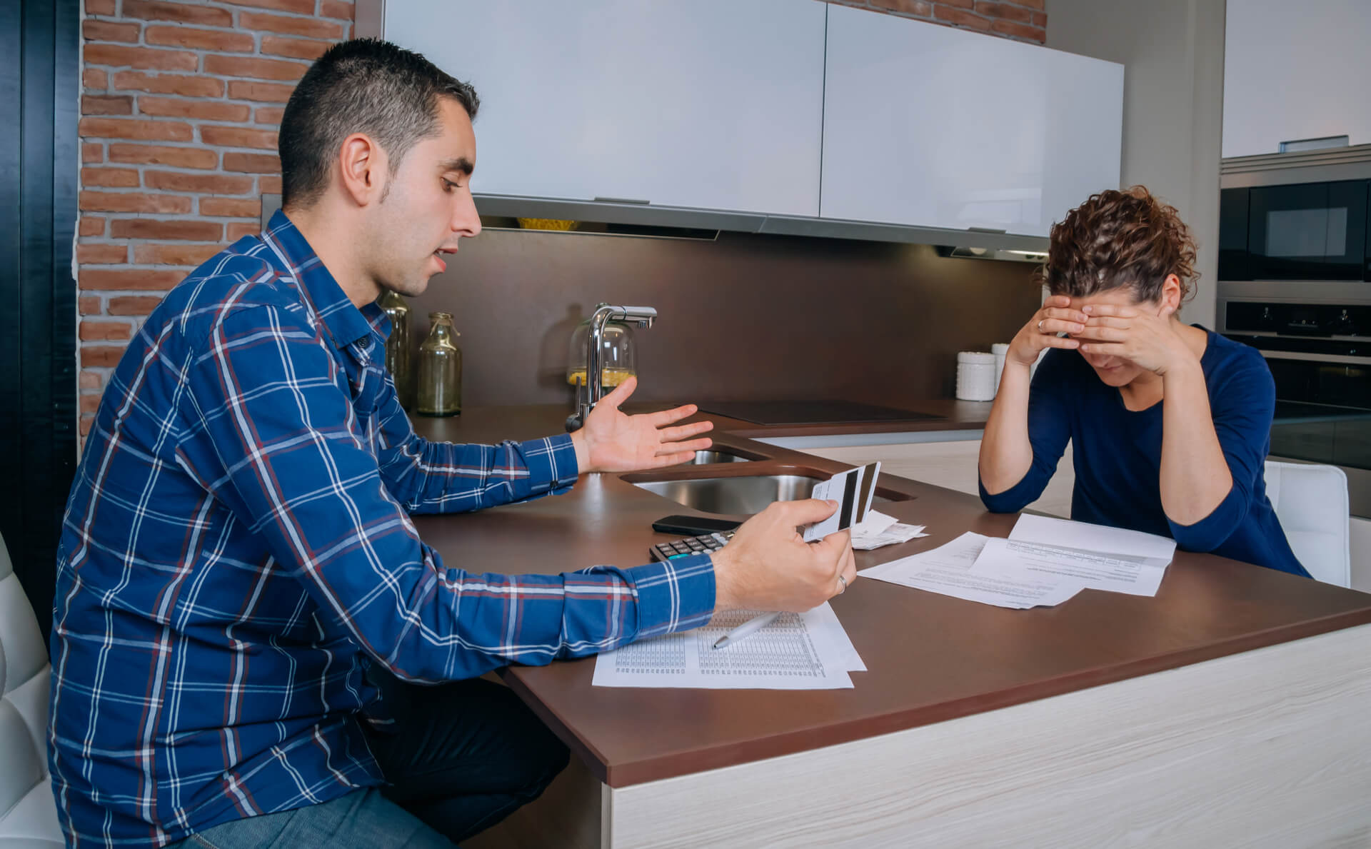 Couple Preparing For Divorce Reviewing Their Credit