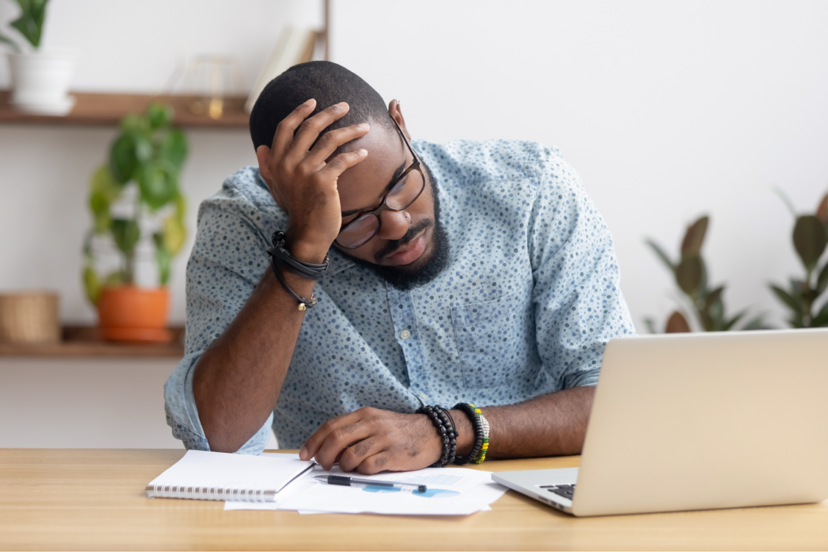 A tired man facing bankruptcy during a divorce