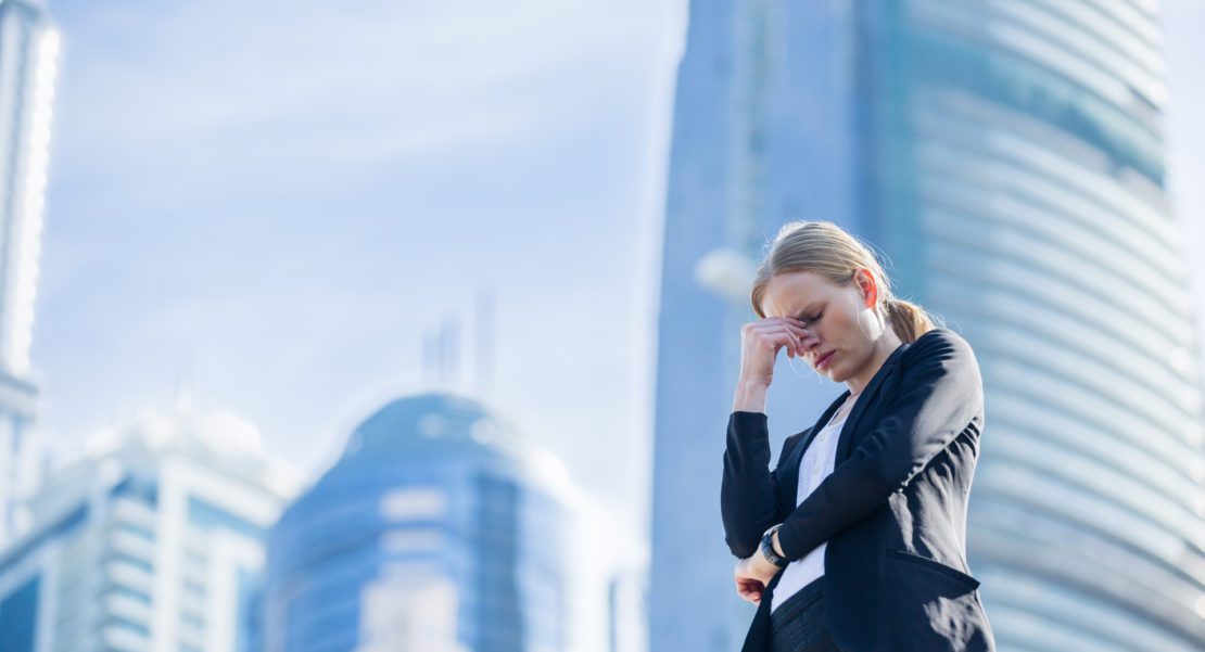 A woman outside her workplace after a divorce