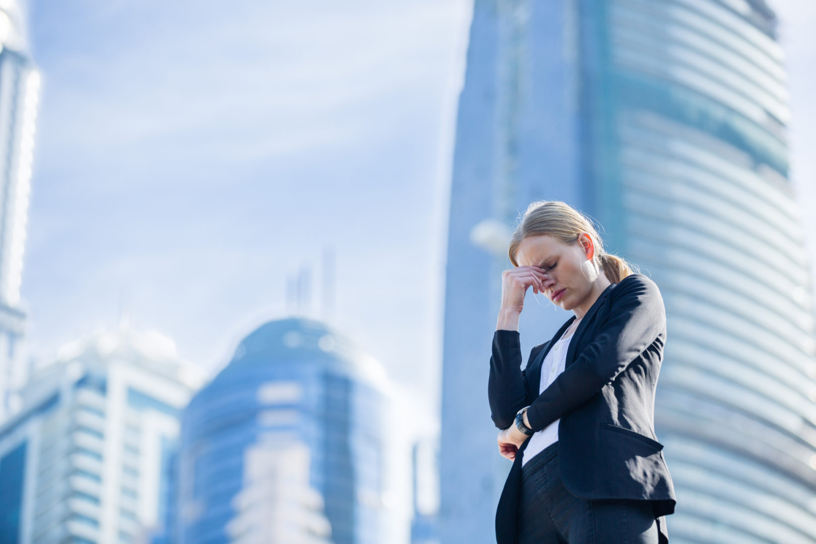 A woman outside her workplace after a divorce